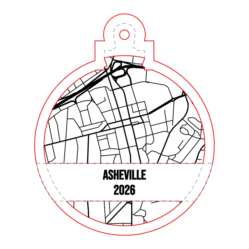 The cut file for a 4 inch Asheville map ornament: walnut front frame with ASHEVILLE 2026 on the name bar over an engraved birch backer, with cut, score and engrave lines on separate layers
