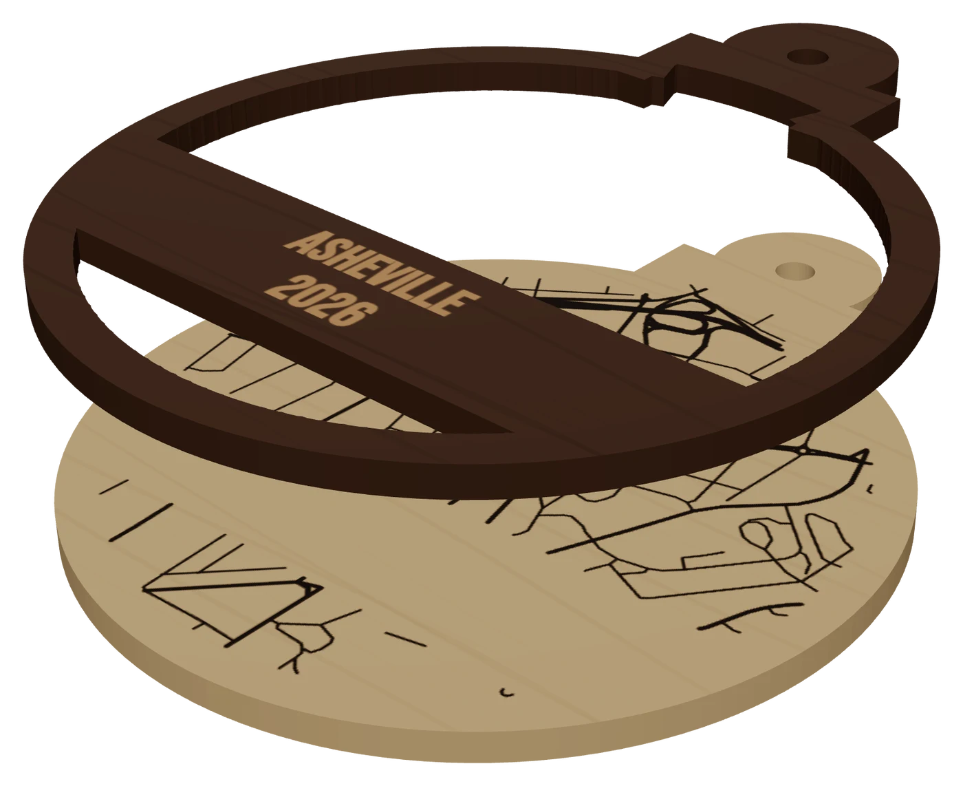 The same piece pulled apart into its layers: a 4 inch Asheville map ornament: walnut front frame with ASHEVILLE 2026 on the name bar over an engraved birch backer