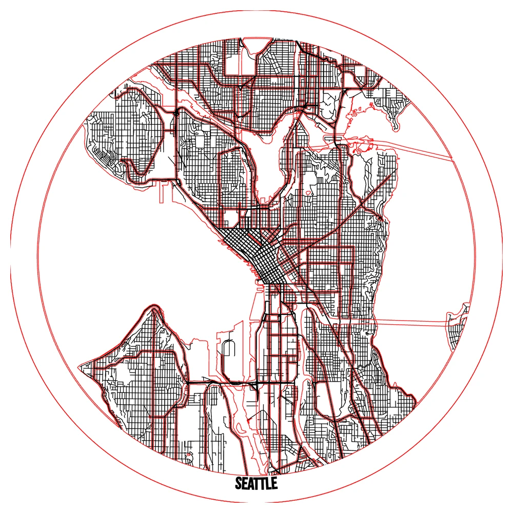 The cut file for a round Seattle stacked map: walnut land, maple streets, blue acrylic water showing through, with cut, score and engrave lines on separate layers