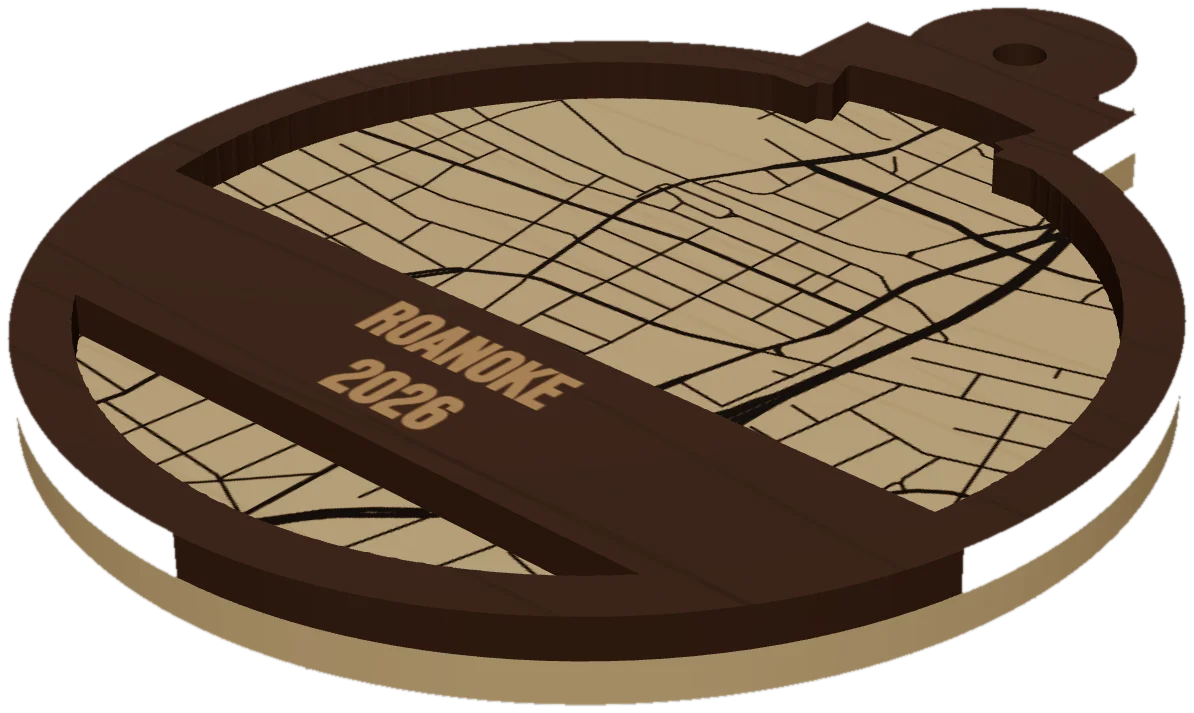 A round map ornament of Roanoke with the name and year on a band across the front