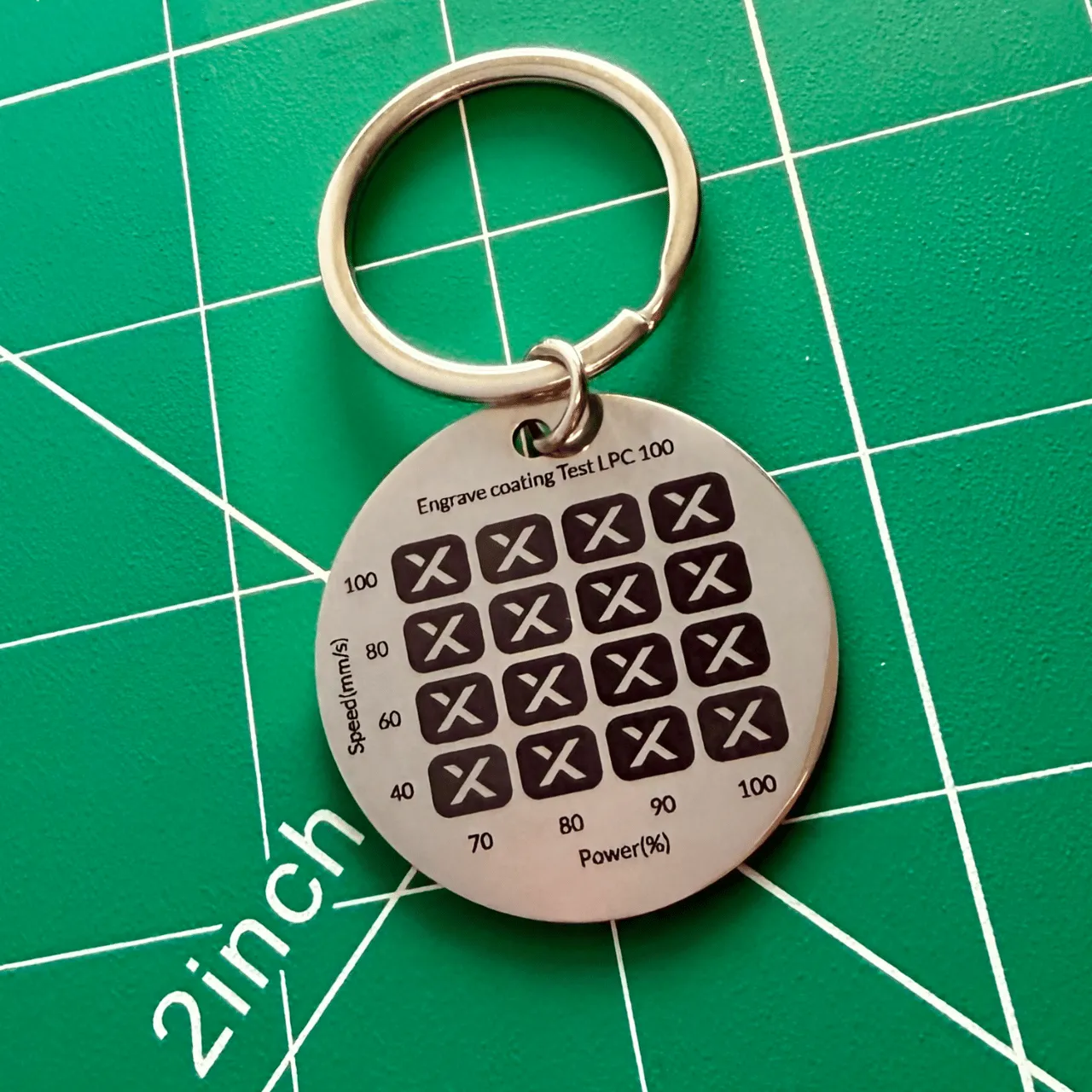 Polished Stainless Steel keychain test grid
